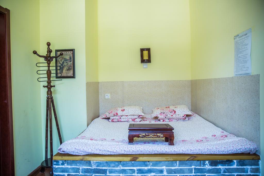 Pingyao Agam International Youth Hostel Номер фото
