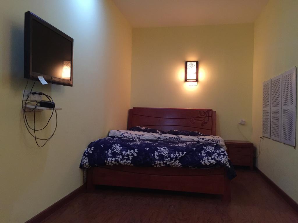 Pingyao Agam International Youth Hostel Номер фото