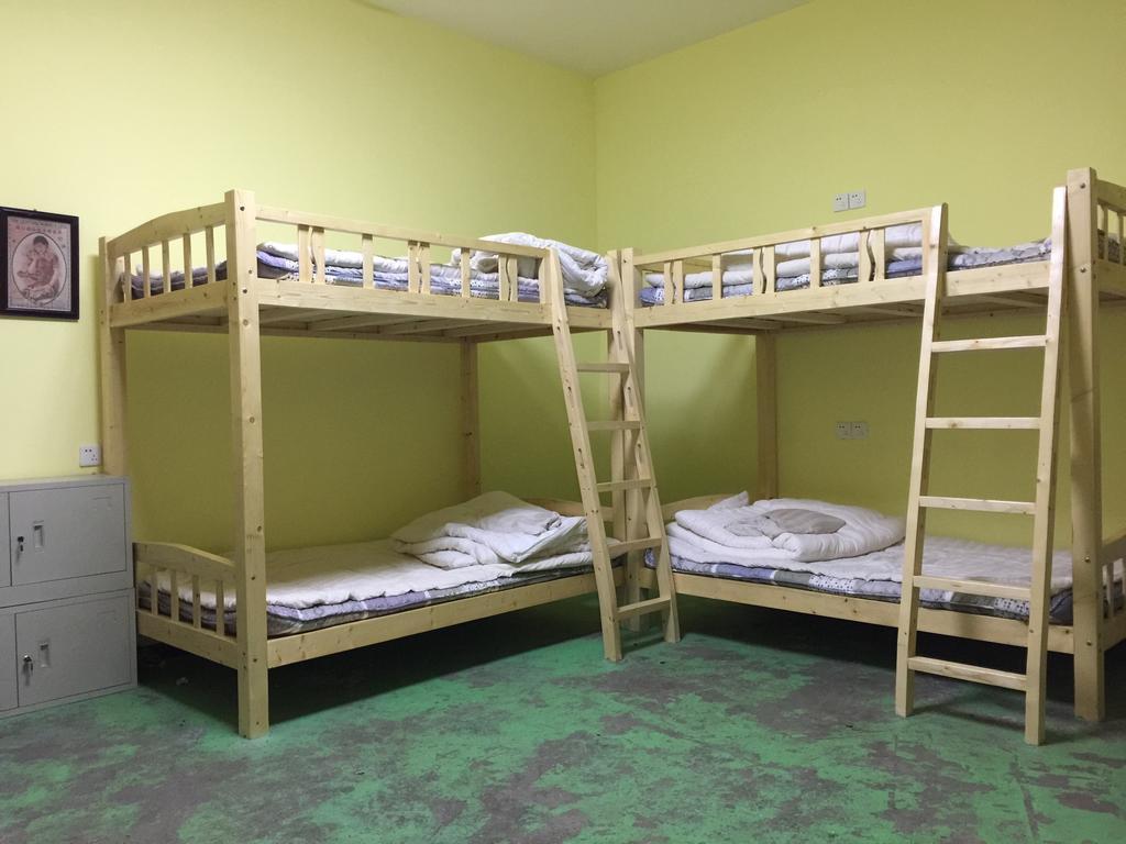 Pingyao Agam International Youth Hostel Номер фото
